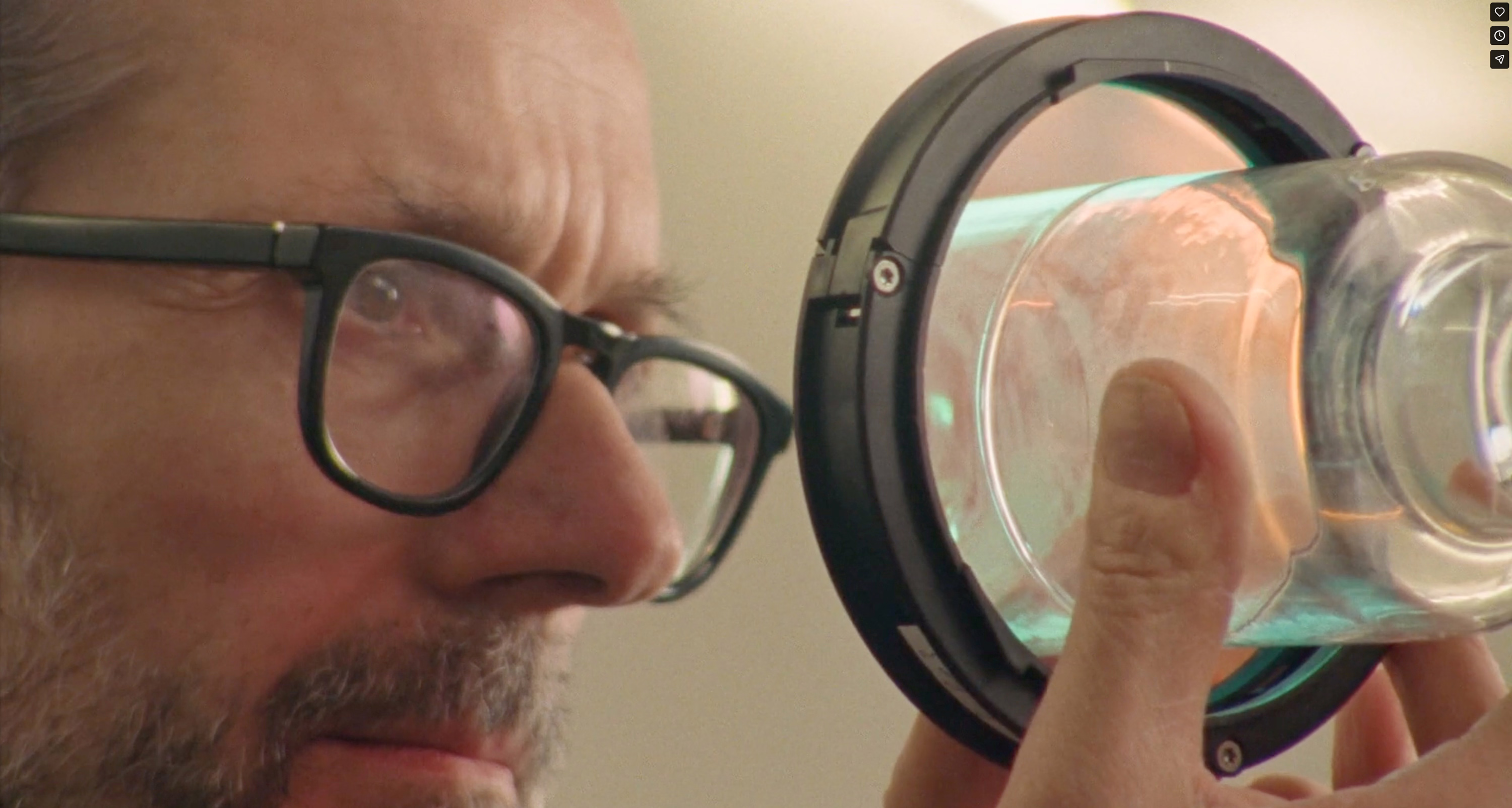 Close-up detail of the FLOS Nocturne blown glass and aluminium ring